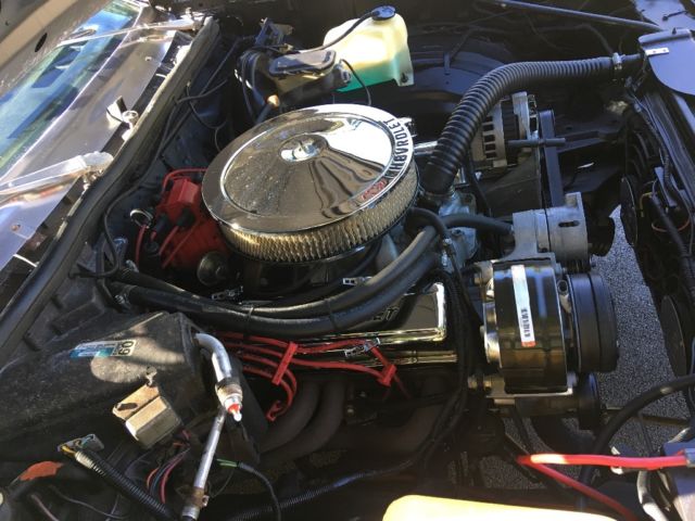 1979 Black metallic/ silver metallic Oldsmobile Cutlass Coupe