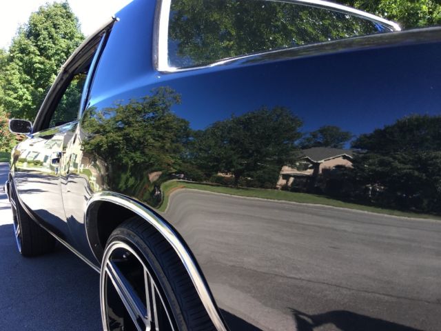 1979 Black metallic/ silver metallic Oldsmobile Cutlass Coupe