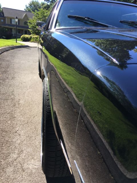 1979 Black metallic/ silver metallic Oldsmobile Cutlass Coupe