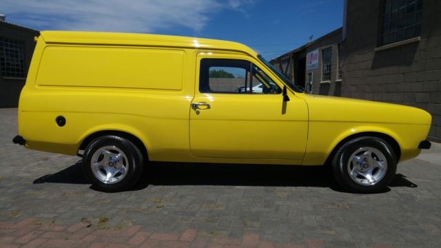 1979 Yellow Ford Escort Minivan