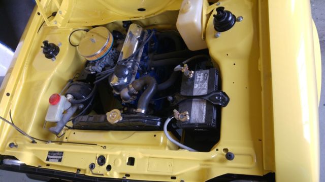 1979 Yellow Ford Escort Minivan