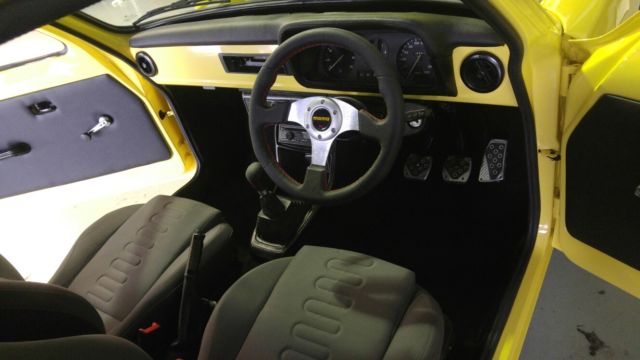 1979 Yellow Ford Escort Minivan
