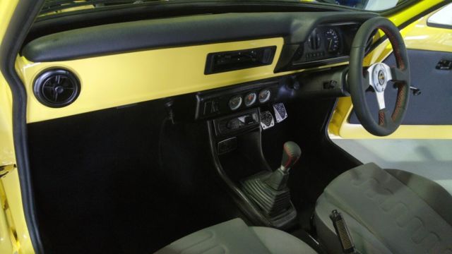 1979 Yellow Ford Escort Minivan