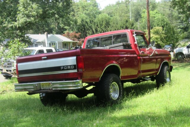 1979 Red Ford F-150 8 foot pickup bed