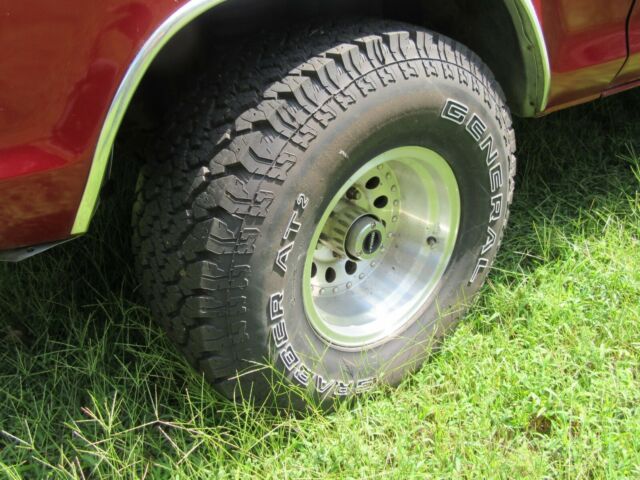 1979 Red Ford F-150 8 foot pickup bed