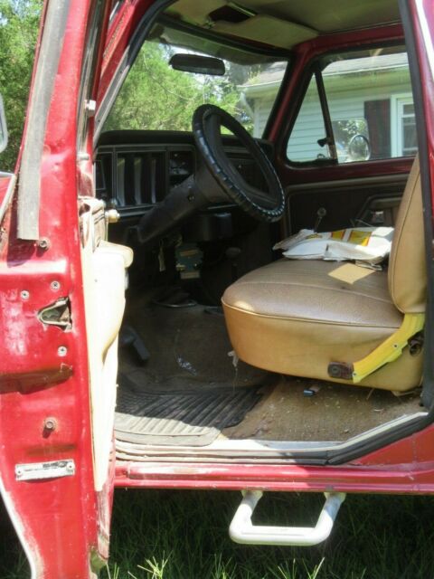 1979 Red Ford F-150 8 foot pickup bed