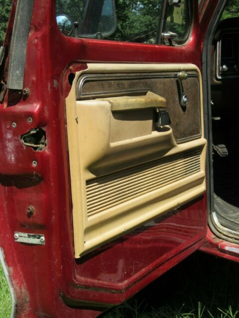 1979 Red Ford F-150 8 foot pickup bed