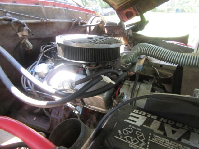 1979 Red Ford F-150 8 foot pickup bed