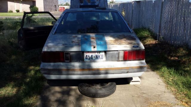 1979 Silver and blue Ford Mustang Hatchback
