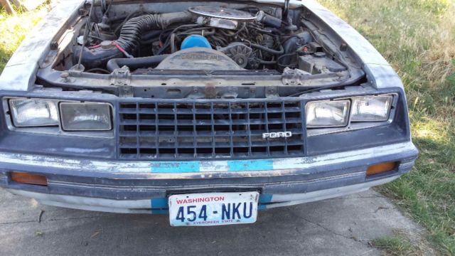 1979 Silver and blue Ford Mustang Hatchback