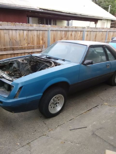 1979 Silver and blue Ford Mustang Hatchback