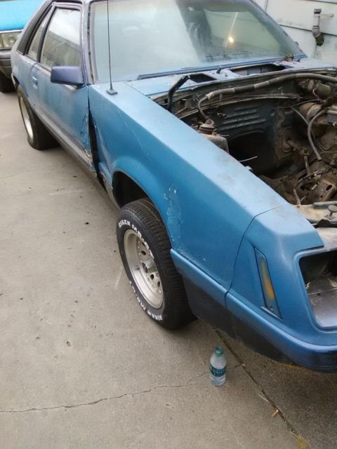 1979 Silver and blue Ford Mustang Hatchback
