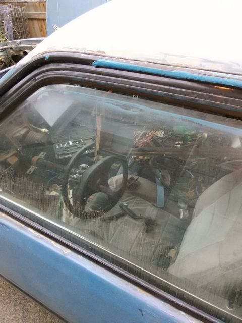 1979 Silver and blue Ford Mustang Hatchback