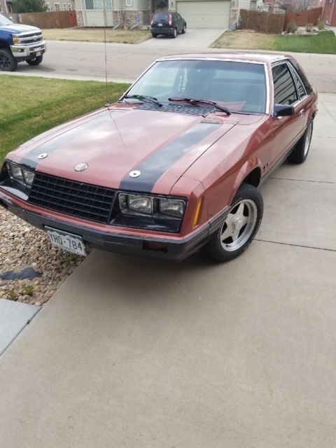 1979 Burnt orange Ford Mustang Hatchback