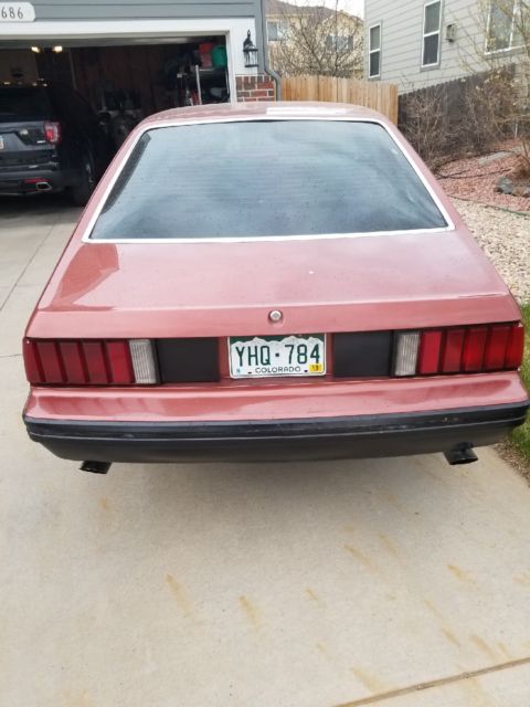 1979 Burnt orange Ford Mustang Hatchback