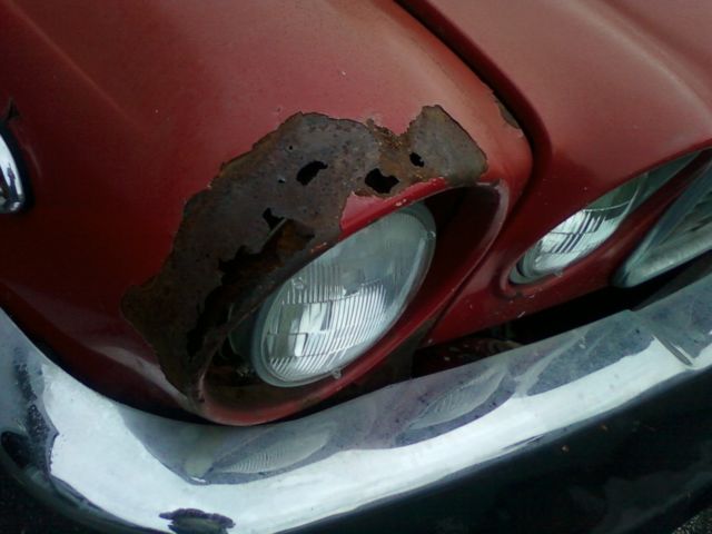 19790000 Red/Orange Jaguar XJ6 Sedan