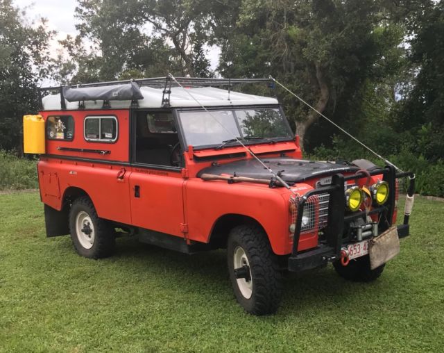 1979 Orange Land Rover 109 hard top SUV