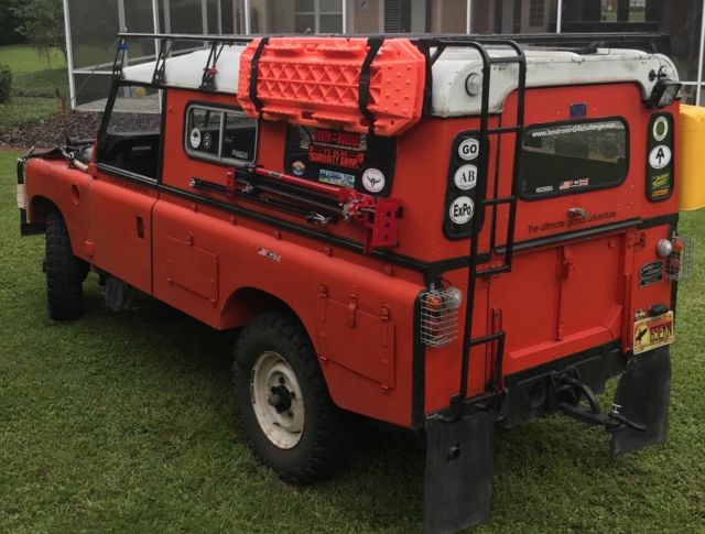 1979 Orange Land Rover 109 hard top SUV