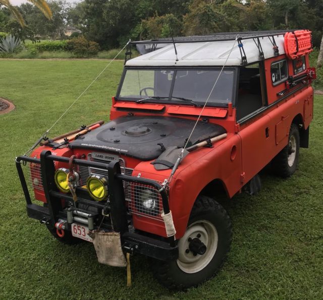 1979 Orange Land Rover 109 hard top SUV