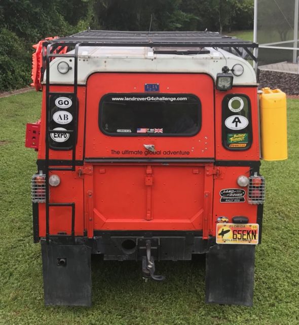 1979 Orange Land Rover 109 hard top SUV