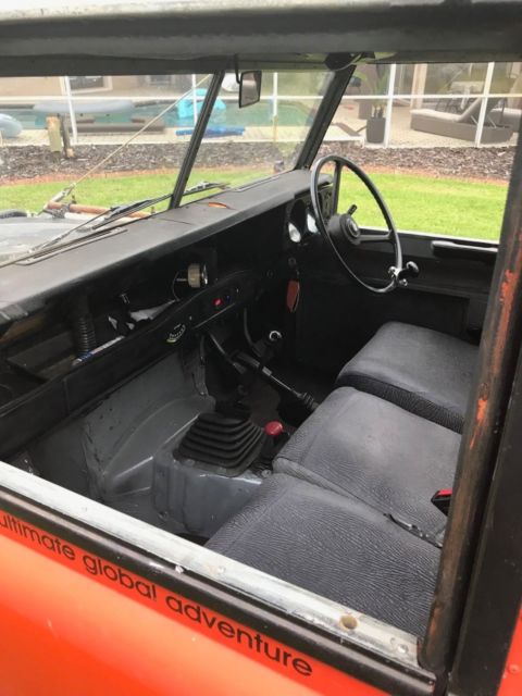 1979 Orange Land Rover 109 hard top SUV