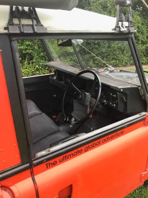 1979 Orange Land Rover 109 hard top SUV