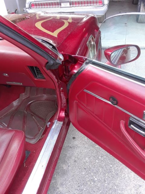 1979 Burgundy Pontiac Trans Am Coupe