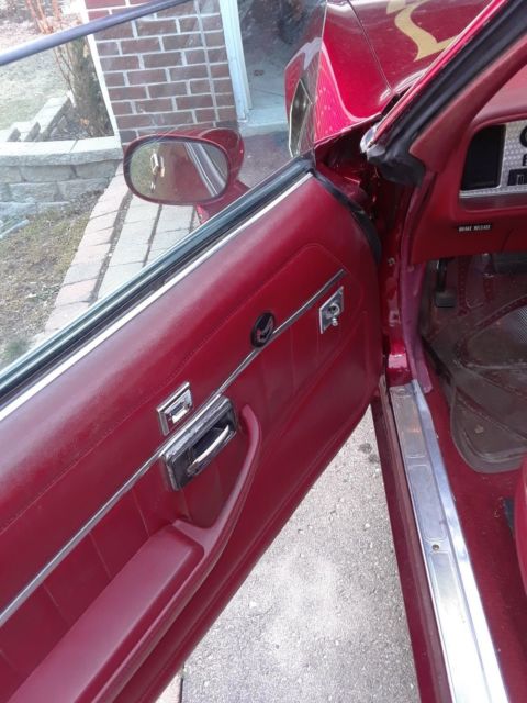 1979 Burgundy Pontiac Trans Am Coupe