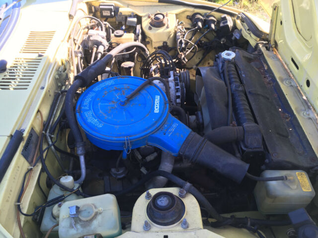 1979 Yellow Mazda RX-7 Coupe