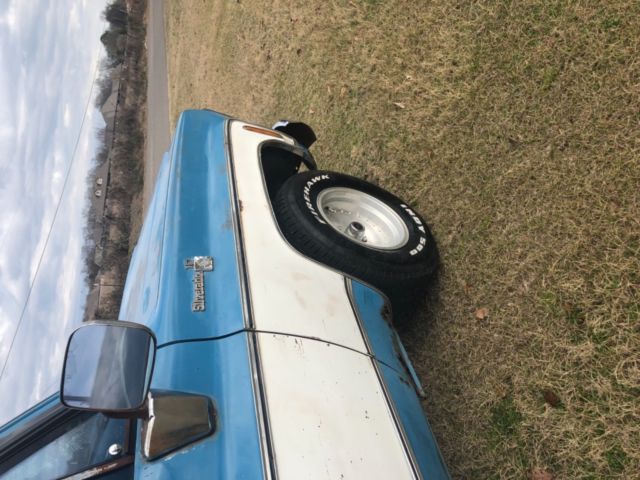 1979 Red and white Chevrolet C-10 Standard Cab Pickup