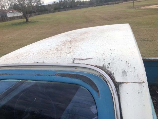 1979 Red and white Chevrolet C-10 Standard Cab Pickup