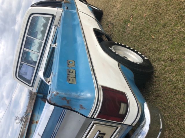 1979 Red and white Chevrolet C-10 Standard Cab Pickup
