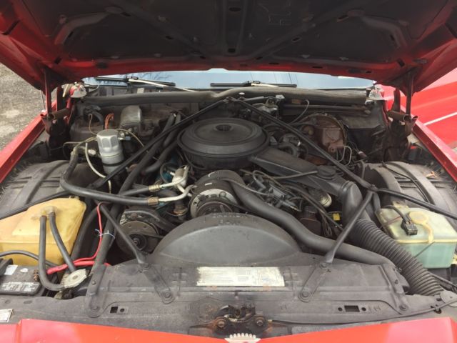 1980 Red Cadillac DeVille Coupe