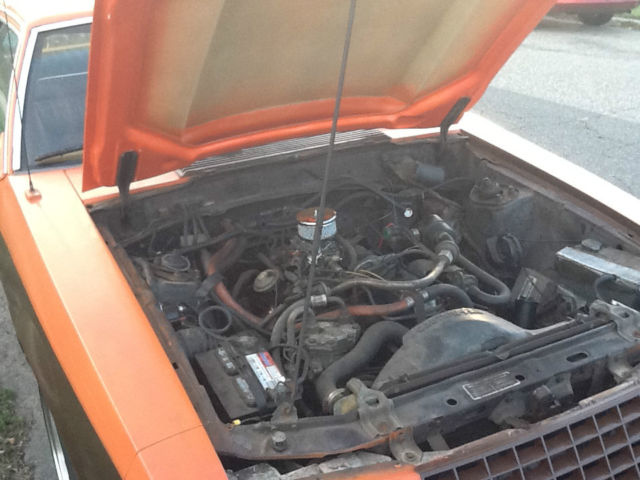1980 Orange and Brown Ford Mustang Coupe