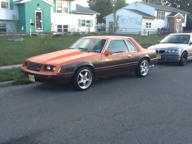 1980 Orange and Brown Ford Mustang Coupe