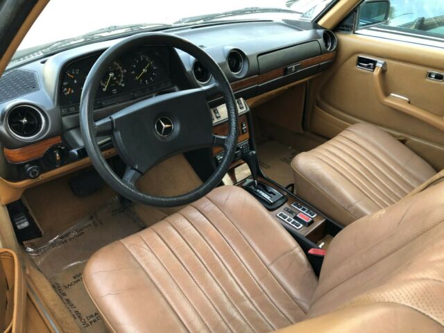 1980 Cream Mercedes-Benz 300-Series Coupe