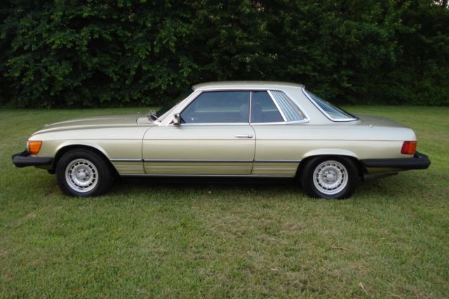 1980 maroon Mercedes-Benz SL-Class Coupe