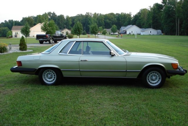 1980 maroon Mercedes-Benz SL-Class Coupe