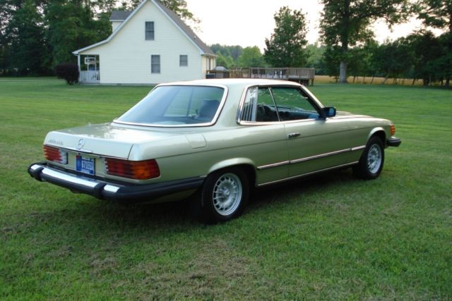 1980 maroon Mercedes-Benz SL-Class Coupe
