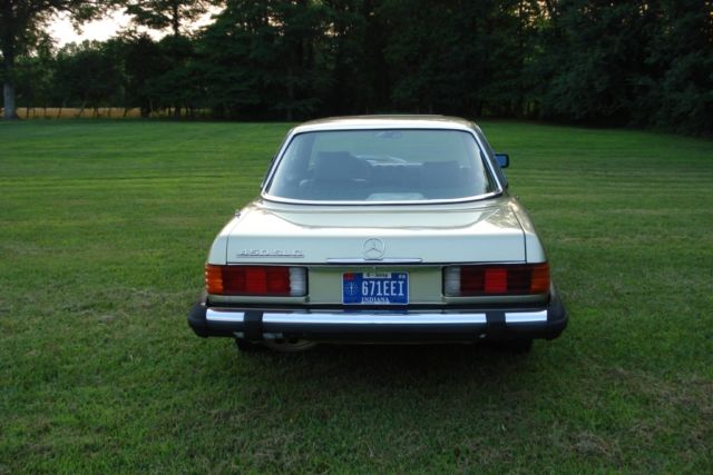 1980 maroon Mercedes-Benz SL-Class Coupe
