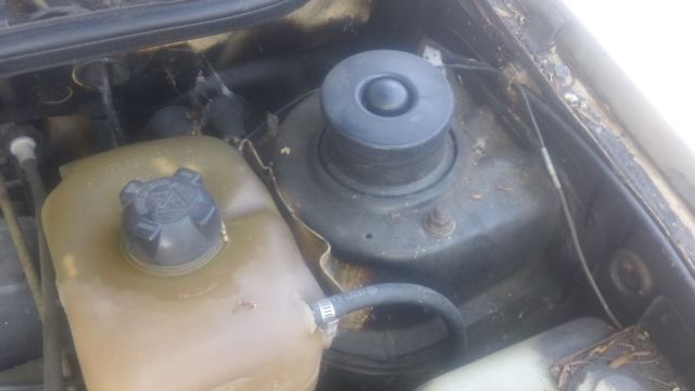 1980 tan Volkswagen Rabbit 2 door hatch