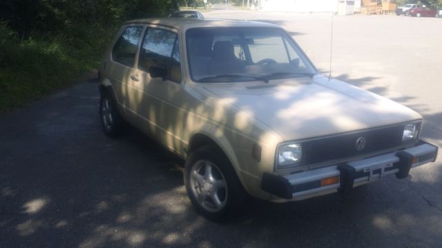 1980 tan Volkswagen Rabbit 2 door hatch