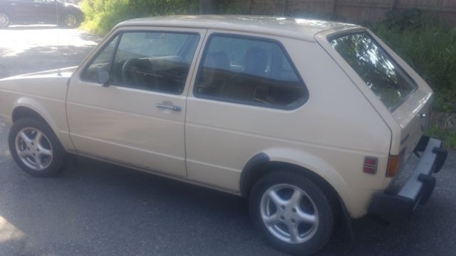 1980 tan Volkswagen Rabbit 2 door hatch