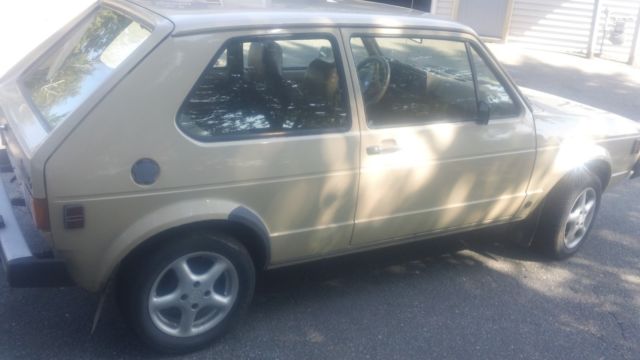 1980 tan Volkswagen Rabbit 2 door hatch