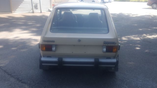 1980 tan Volkswagen Rabbit 2 door hatch