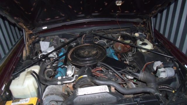 1981 Burgundy Cadillac Fleetwood Coupe