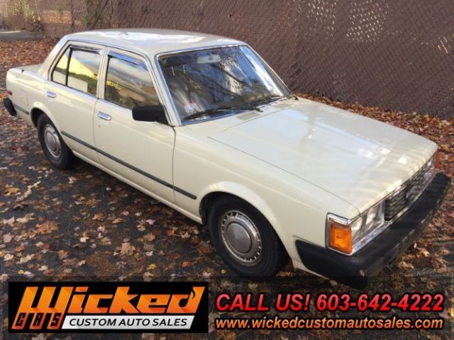 1981 beige Toyota Corona Sedan 4 Dr.