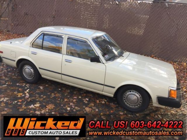 1981 beige Toyota Corona Sedan 4 Dr.