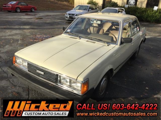 1981 beige Toyota Corona Sedan 4 Dr.