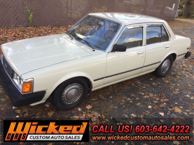 1981 beige Toyota Corona Sedan 4 Dr.